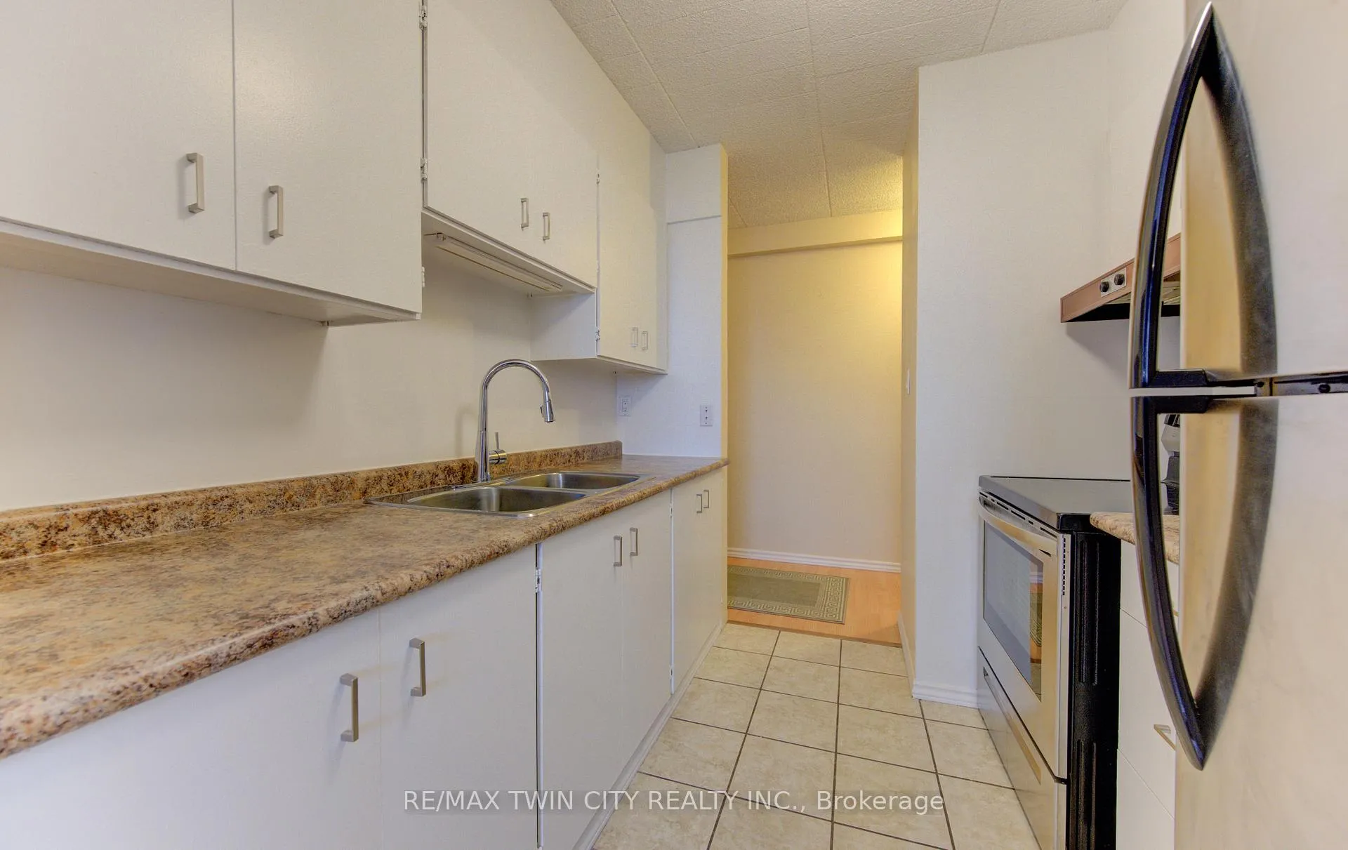 Photo 10 of Unit 305, 24 Mooregate Crescent, Kitchener — HOMEH