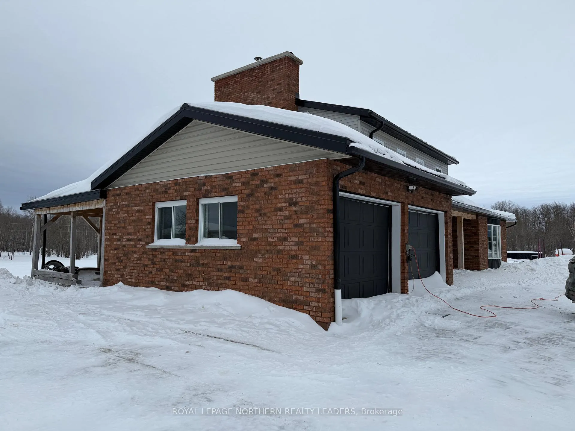 Photo 2 of 576 Carrigan Road, Timmins, TM - Outside East — HOMEH