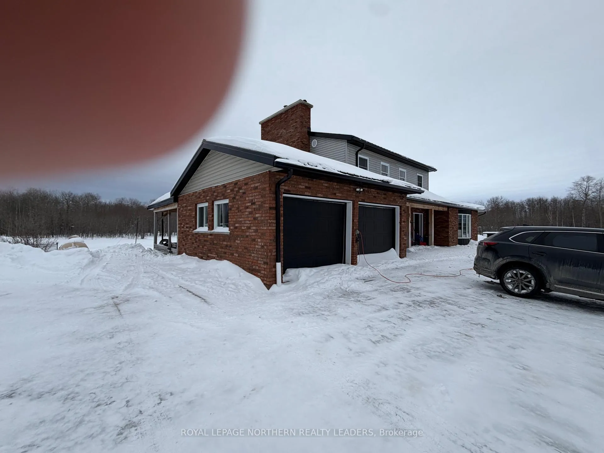 Photo 3 of 576 Carrigan Road, Timmins, TM - Outside East — HOMEH