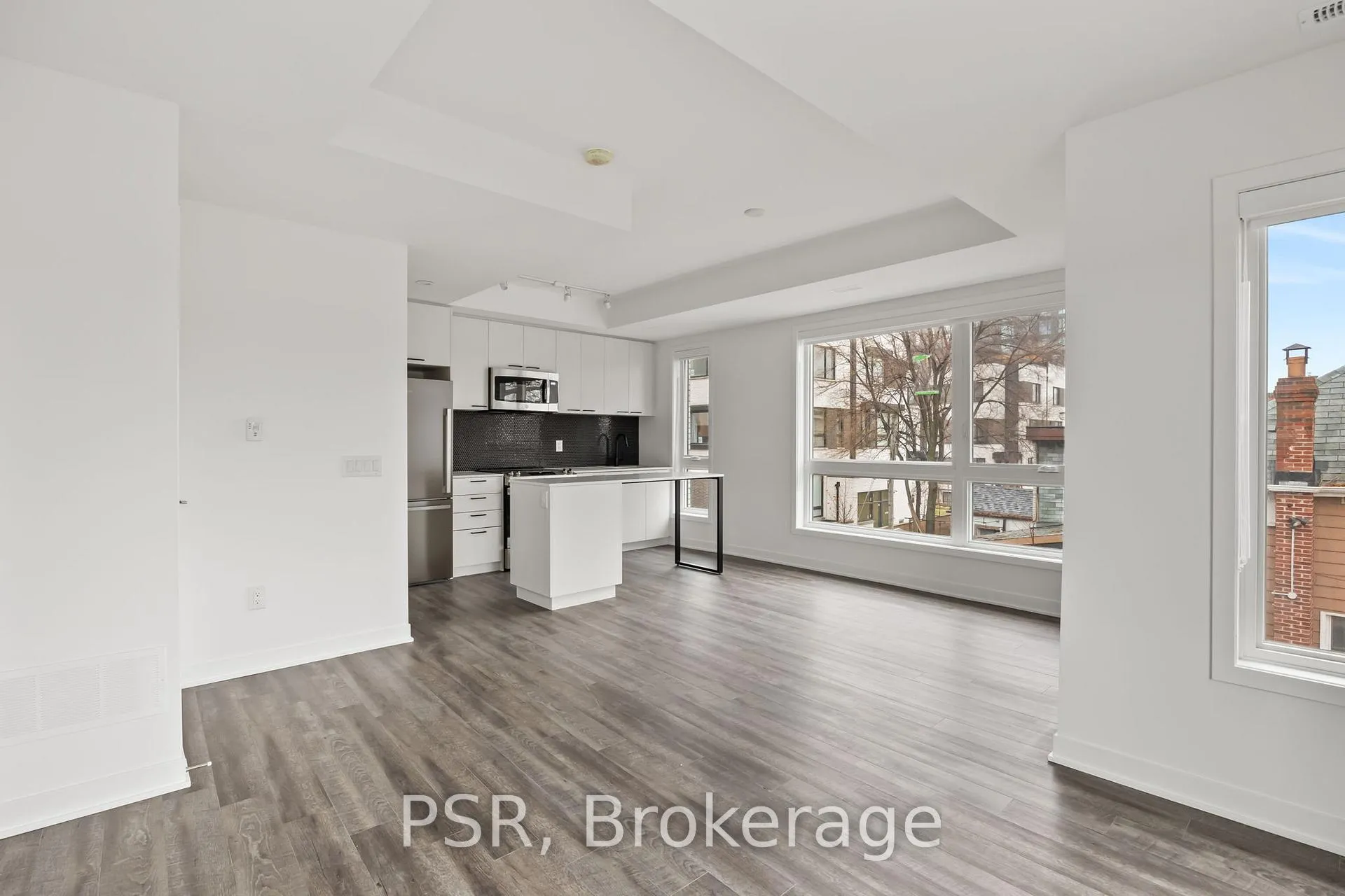 Photo 6 of Unit TH13, 40 Ed Clark Gardens Boulevard, Toronto, Weston-Pellam Park — HOMEH