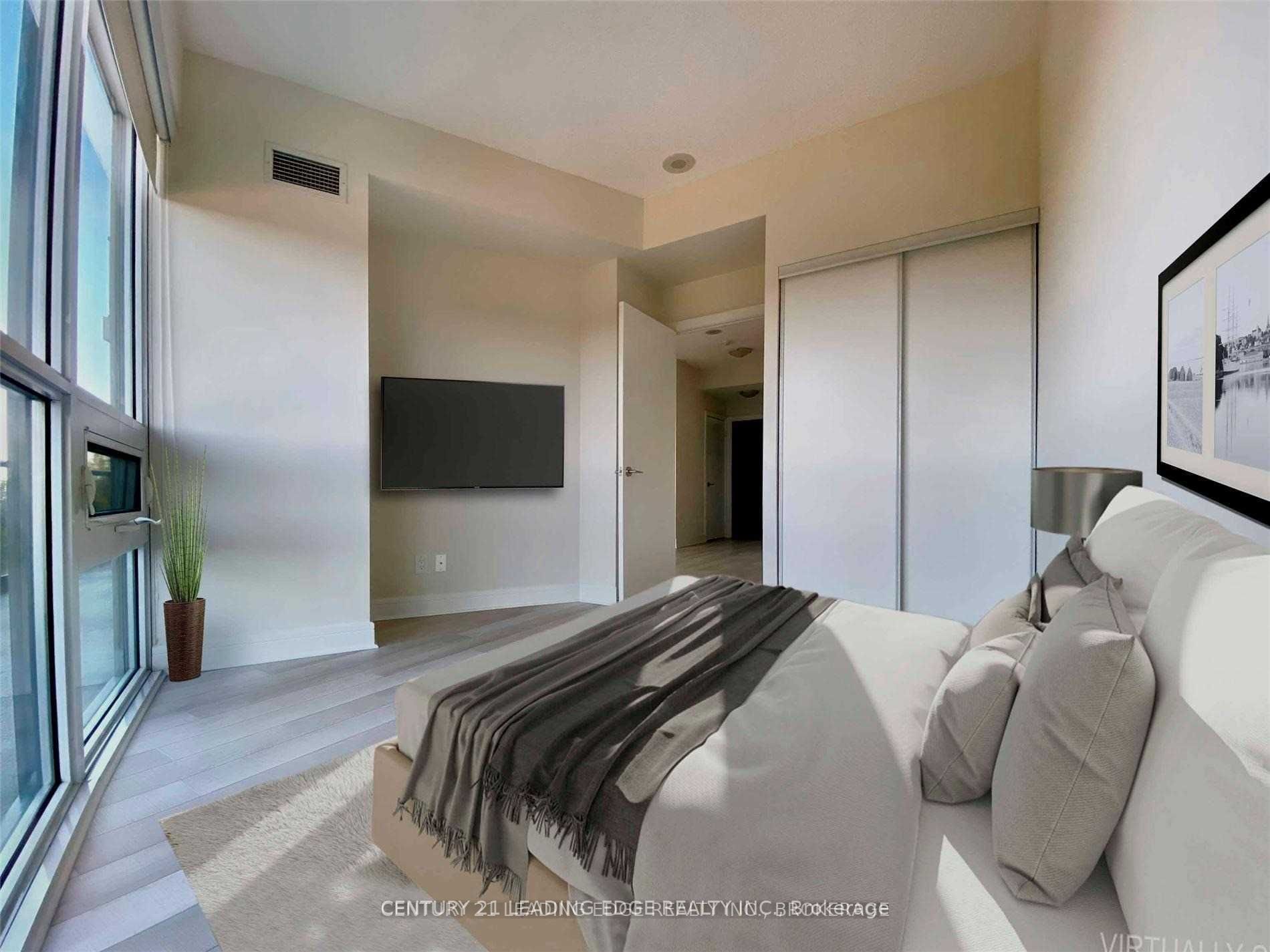 Photo 4 of Unit 406, 35 Brian Peck Crescent, Toronto, Thorncliffe Park — HOMEH