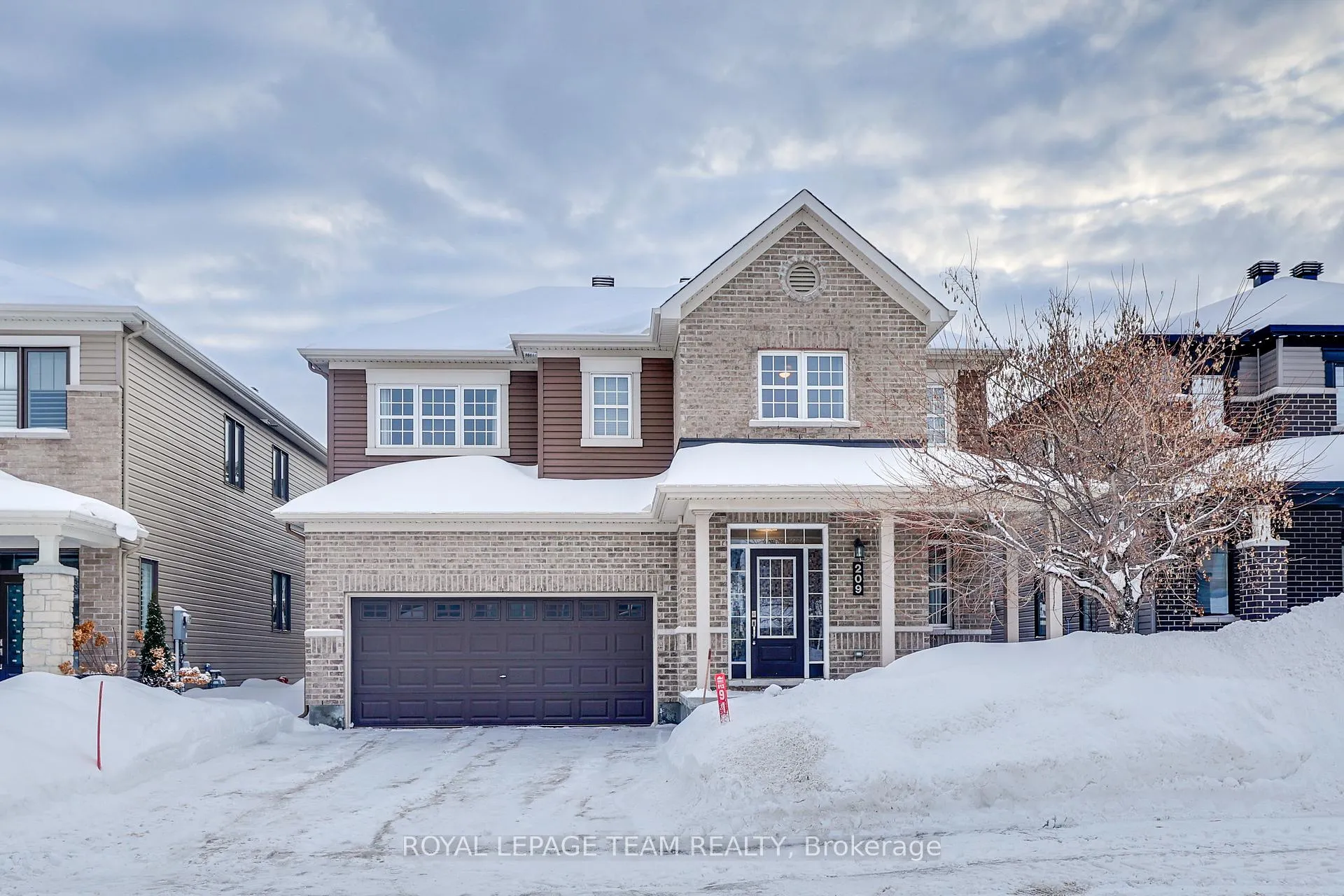Front of 209 Mission Trail Crescent