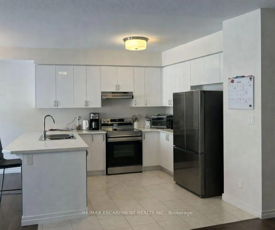 Photo 6 of 20 Dennis Avenue, Brantford — HOMEH
