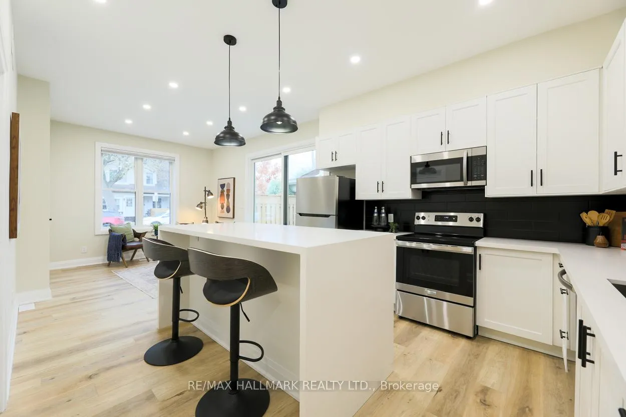Photo 6 of Unit Main Floor, 6 Luttrell Avenue, Toronto, East End-Danforth — HOMEH