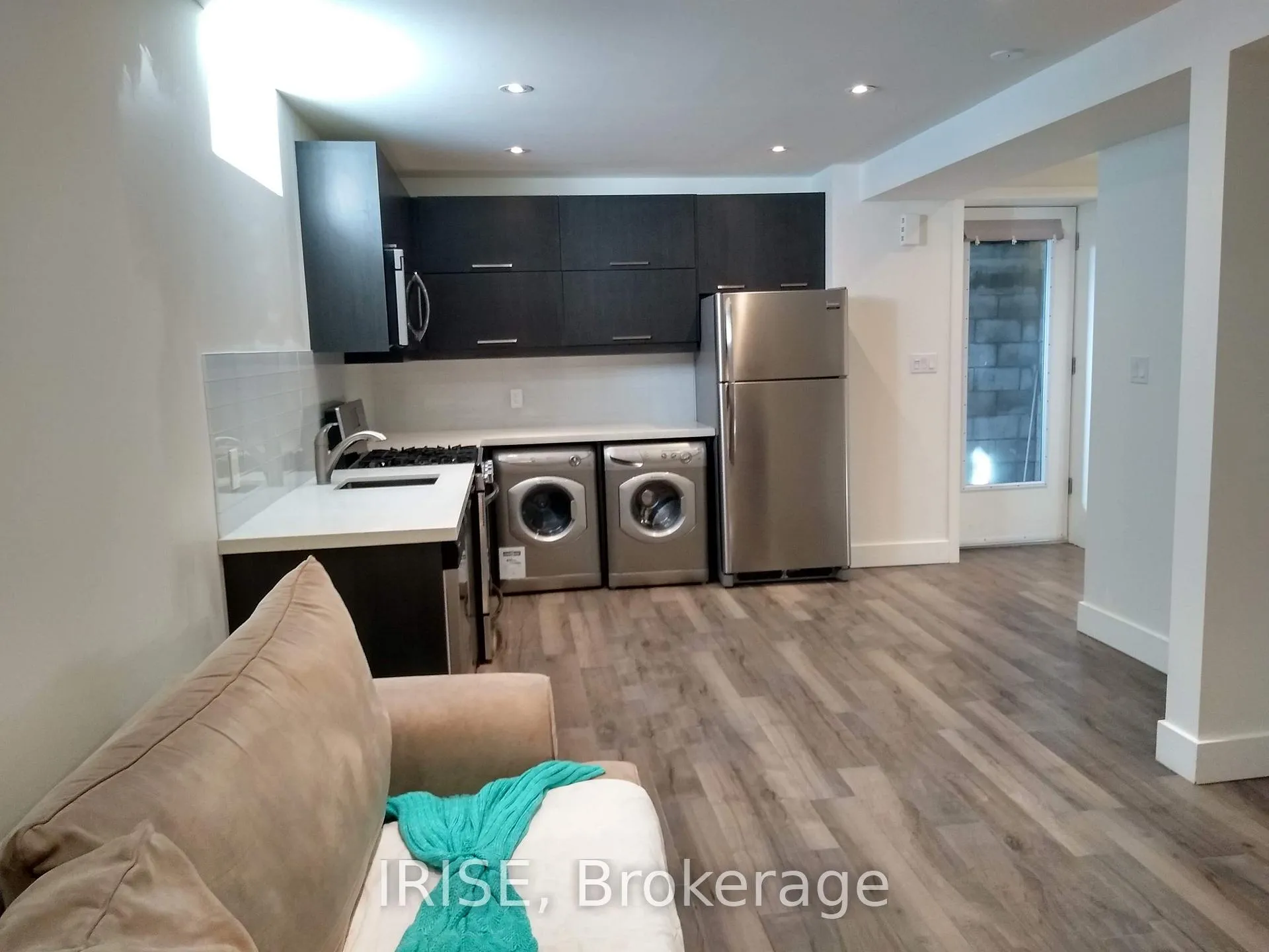 Photo 3 of Unit Lower, 11 Donmore Avenue, Toronto, Danforth Village-East York — HOMEH