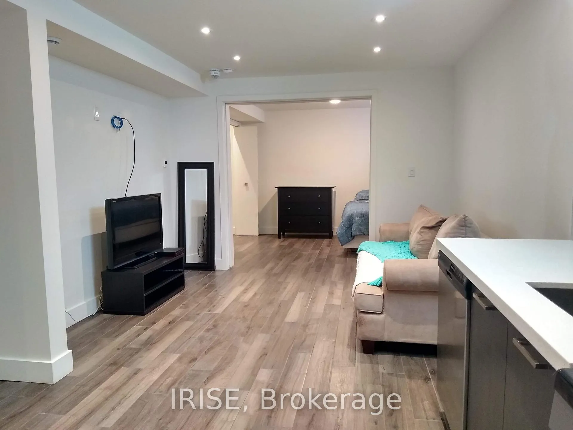 Photo 4 of Unit Lower, 11 Donmore Avenue, Toronto, Danforth Village-East York — HOMEH