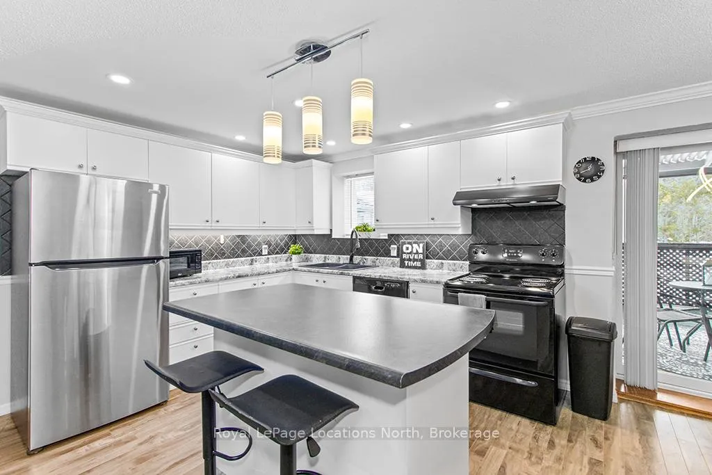 Photo 9 of Unit 3, 891 River Road W, Wasaga Beach — HOMEH