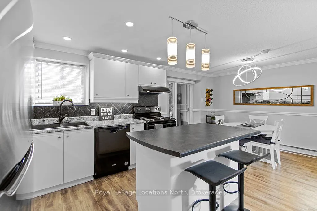 Photo 10 of Unit 3, 891 River Road W, Wasaga Beach — HOMEH