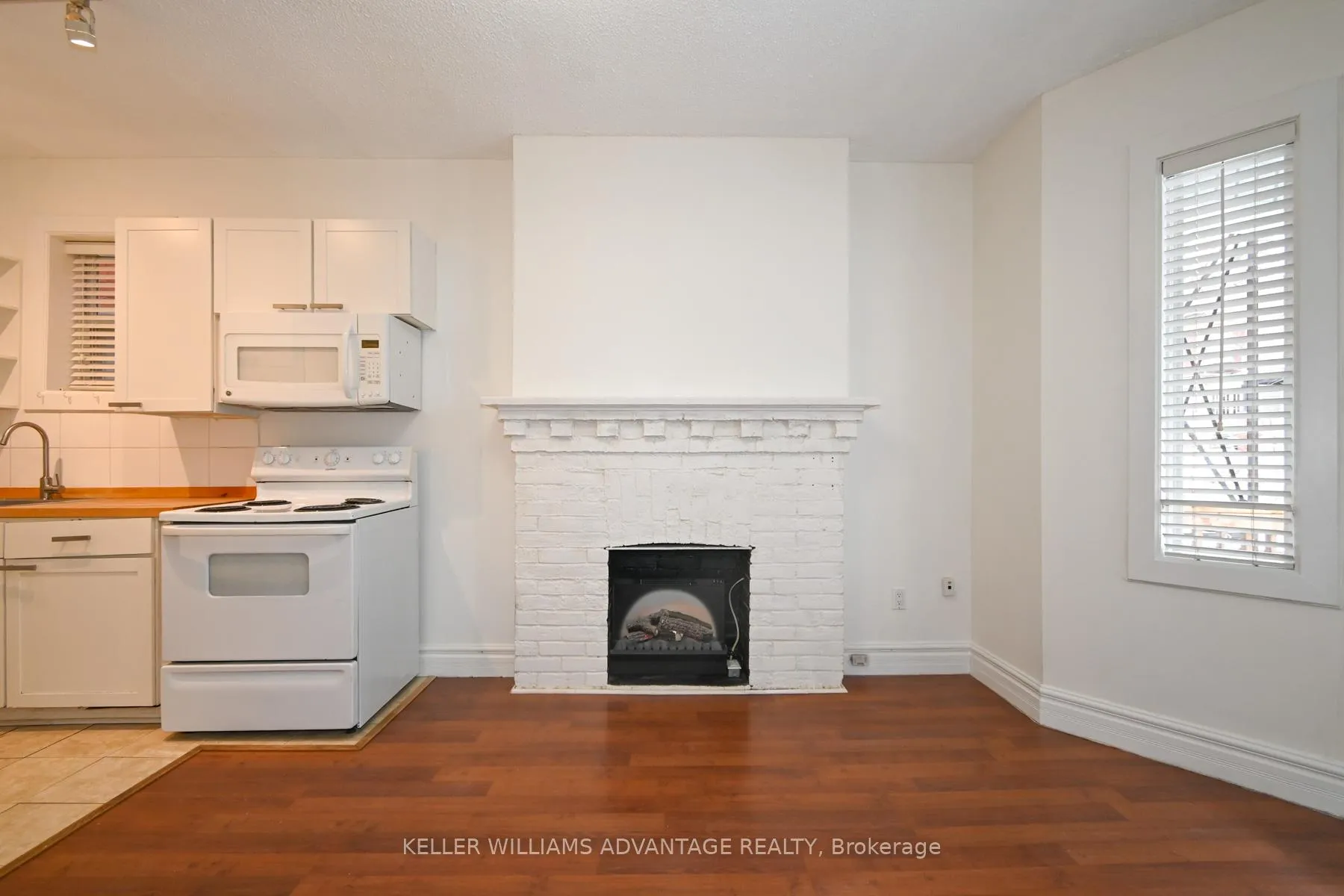 Photo 5 of Unit A, 242 Highfield Road, Toronto, Greenwood-Coxwell — HOMEH