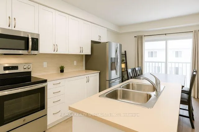 Photo 3 of 23 Shelburne Avenue, Wasaga Beach — HOMEH