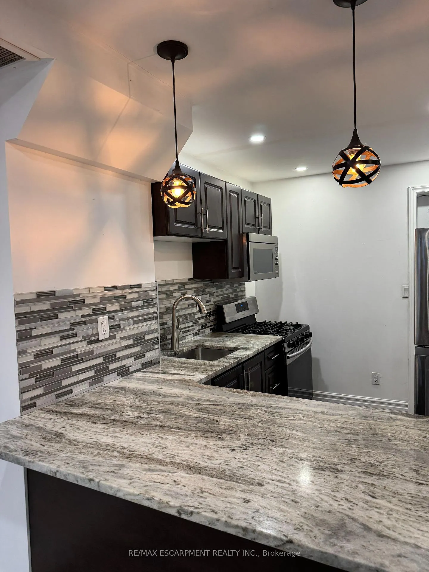 Photo 2 of Unit 1, 1152 King Street E, Hamilton, Crown Point — HOMEH
