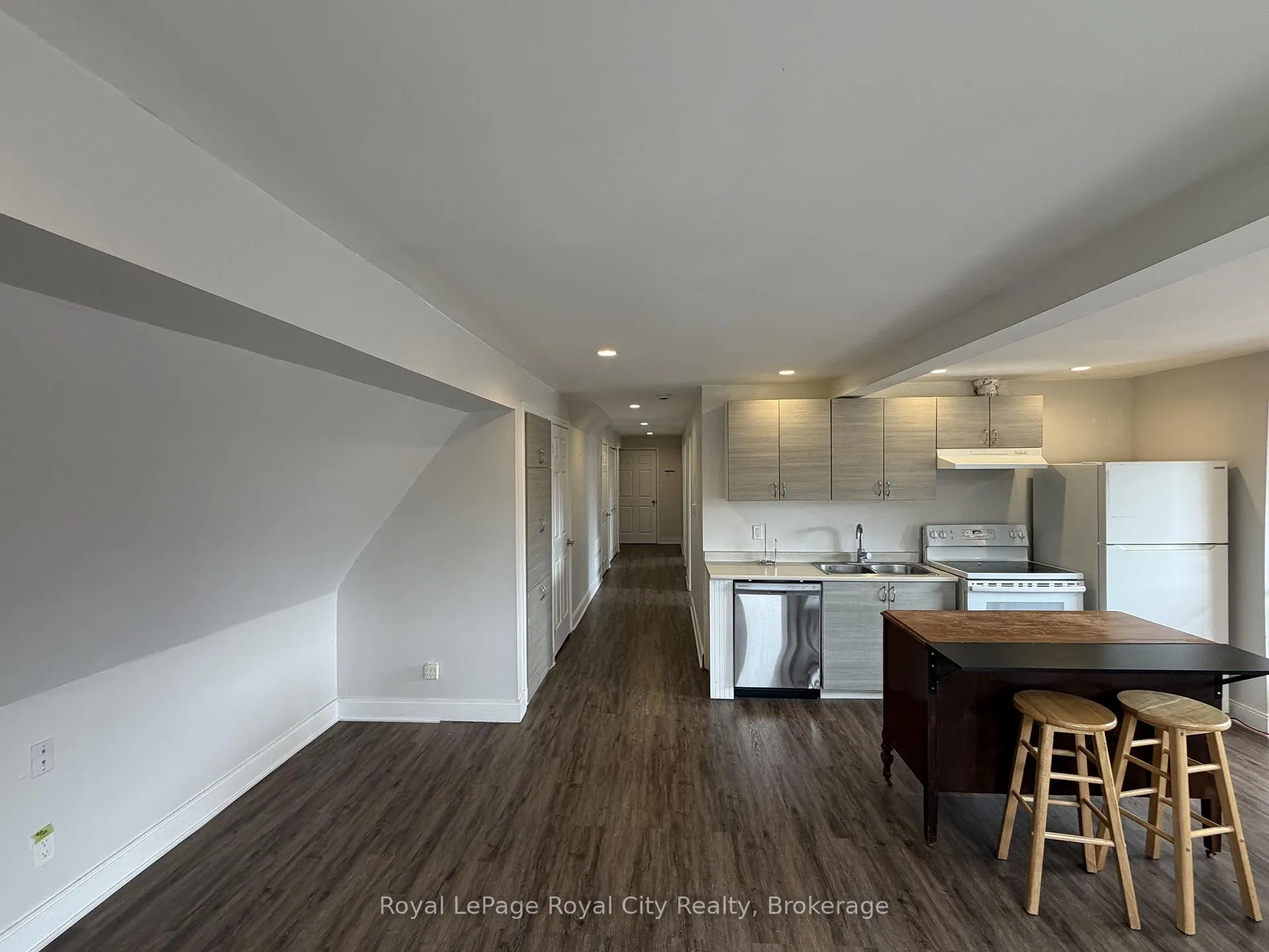 Photo 4 of Unit 1, 563 Woolwich Street, Guelph, Exhibition Park — HOMEH