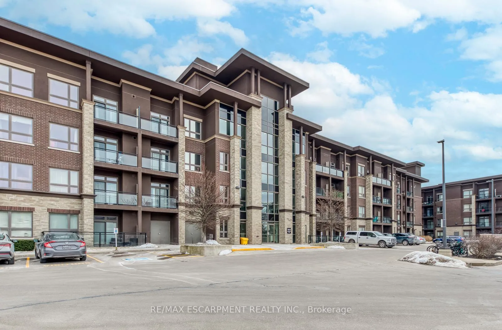 Photo 2 of Unit 114, 5010 Corporate Drive, Burlington, Uptown — HOMEH