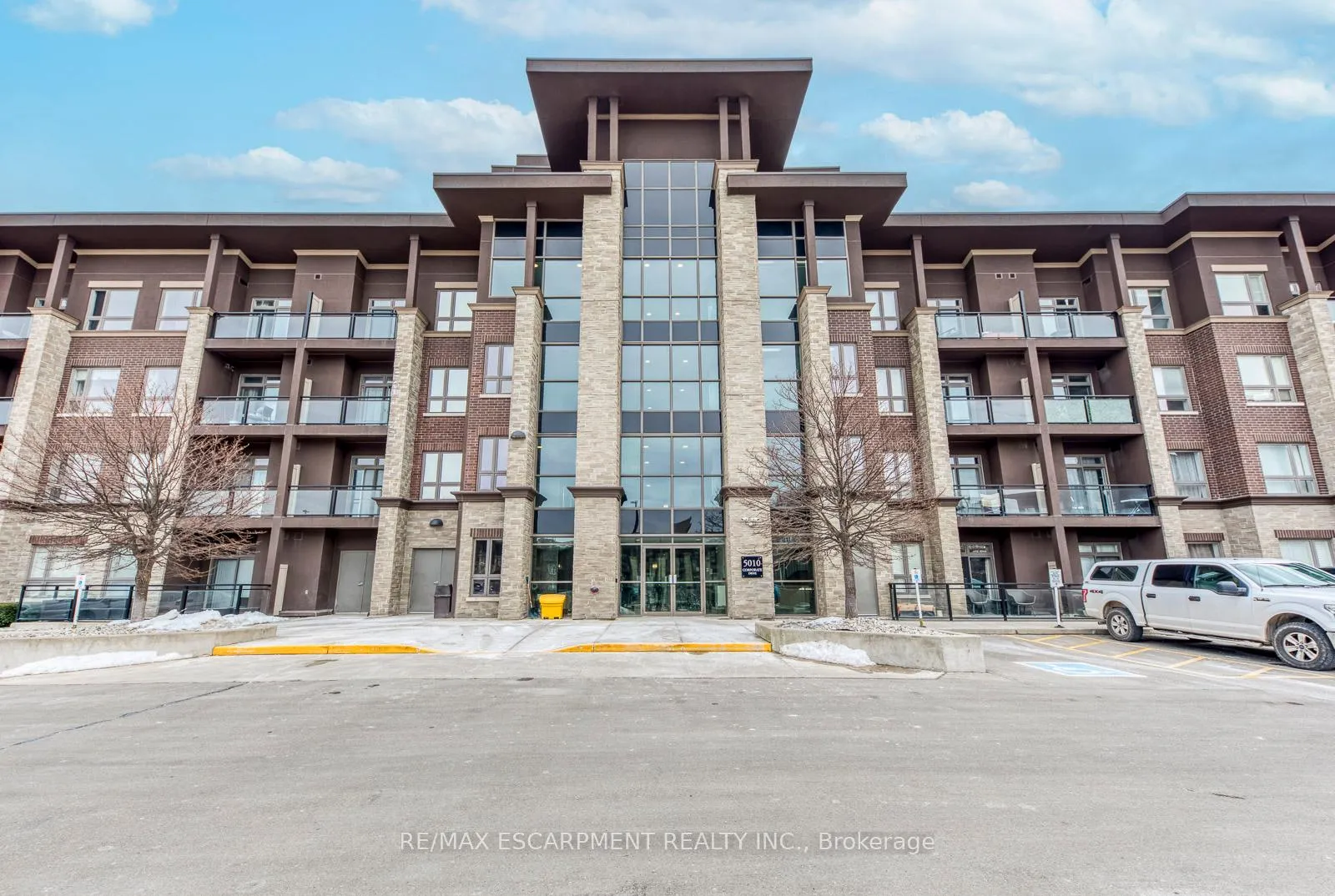 Photo 3 of Unit 114, 5010 Corporate Drive, Burlington, Uptown — HOMEH