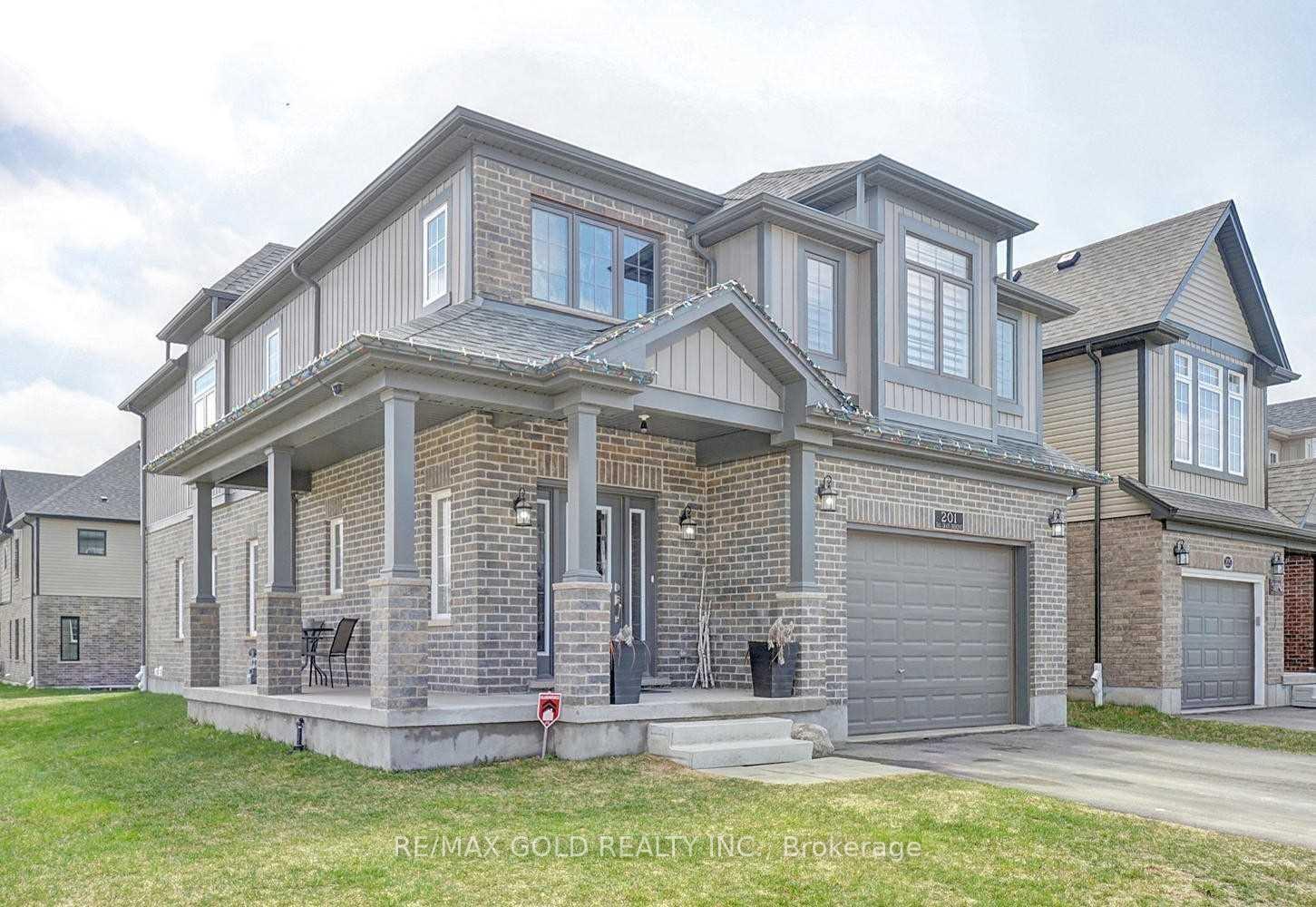 Front of 201 Tall Grass Crescent