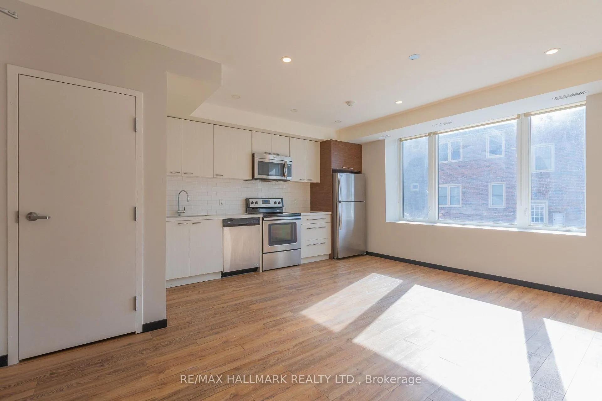 Photo 2 of Unit 1, 2277 Queen Street E, Toronto, The Beaches — HOMEH