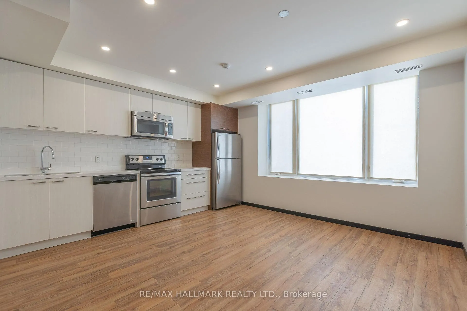 Photo 3 of Unit 1, 2277 Queen Street E, Toronto, The Beaches — HOMEH