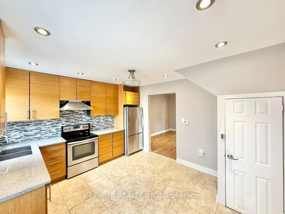 Photo 3 of Unit 1, 8 Hatherley Road, Toronto, Caledonia-Fairbank — HOMEH
