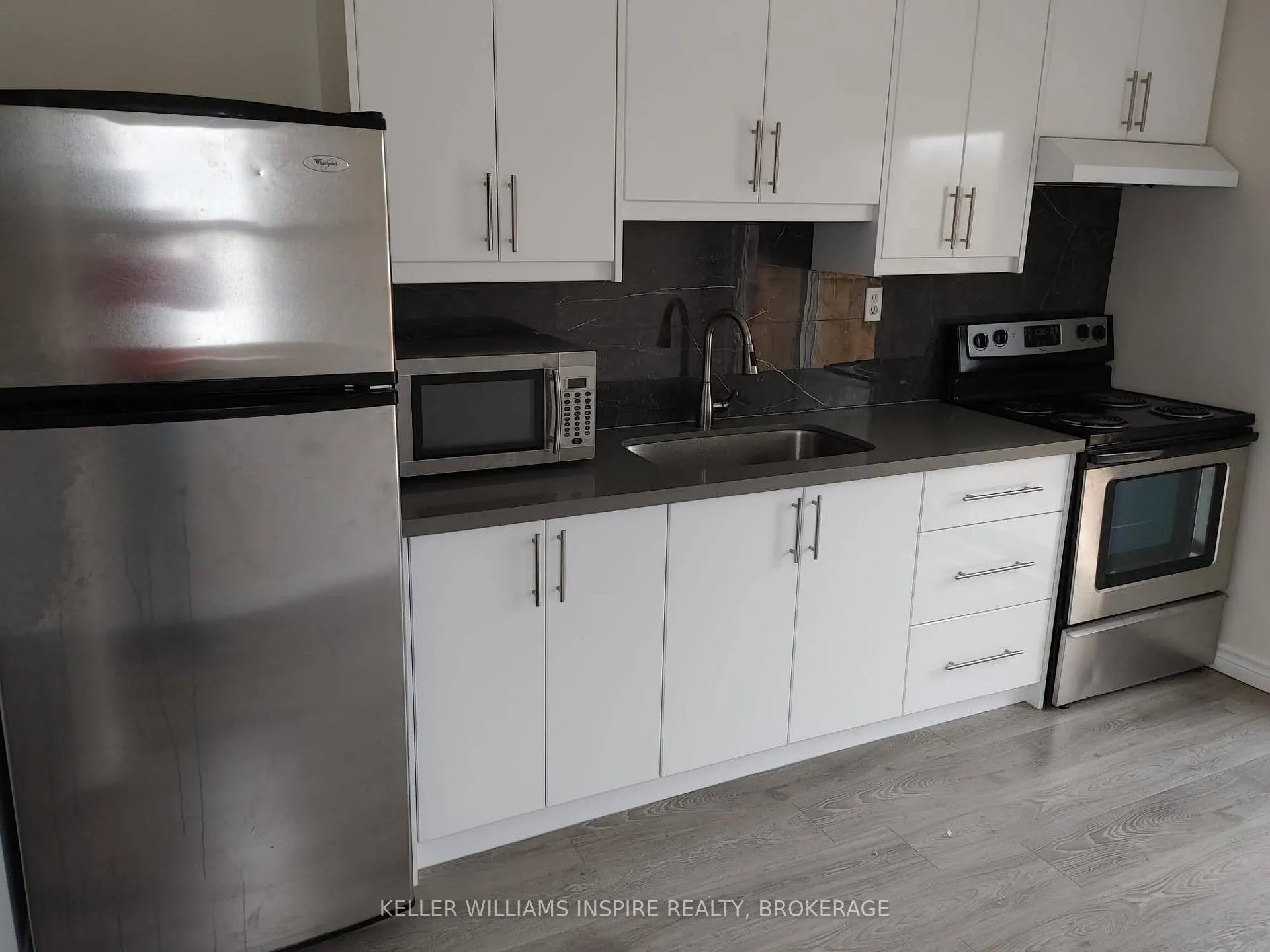 Photo 5 of Unit 1, 29 Grey Street, Kingston, East of Sir John A. Blvd — HOMEH