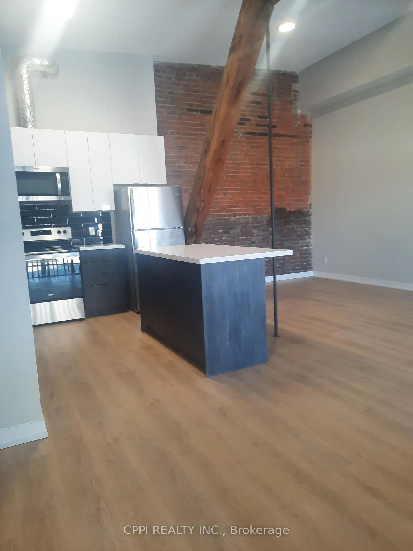 Photo 2 of Unit 203, 140 Simcoe Street, Peterborough, Town Ward 3 — HOMEH