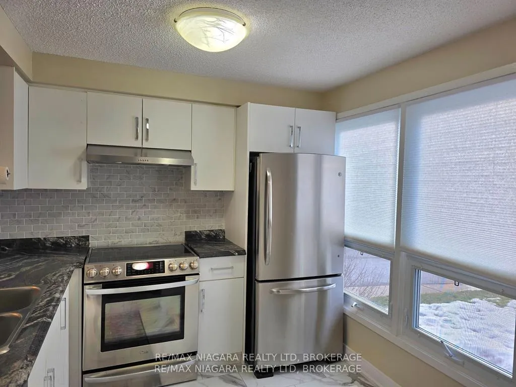Photo 4 of Unit 7, 6767 Thorold Stone Road, Niagara Falls, Stamford — HOMEH