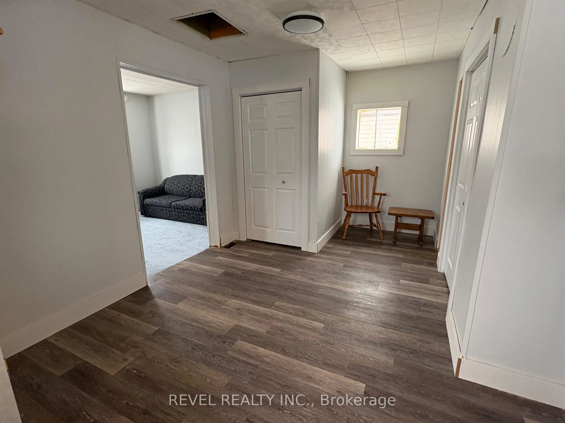Photo 2 of 104 Fourteenth Avenue, Cochrane — HOMEH