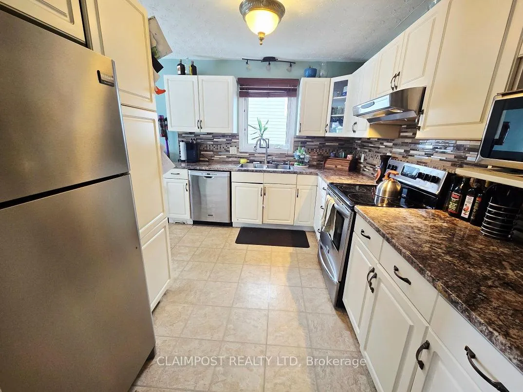 Photo 6 of 1266 Park Avenue, Timmins, MTJ - Main Area — HOMEH