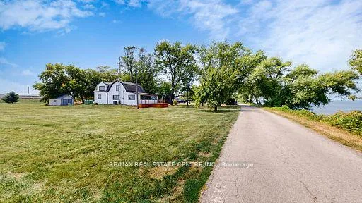 Photo 1 of 4036 Lakeshore Road, Lincoln, Lincoln Lake — HOMEH
