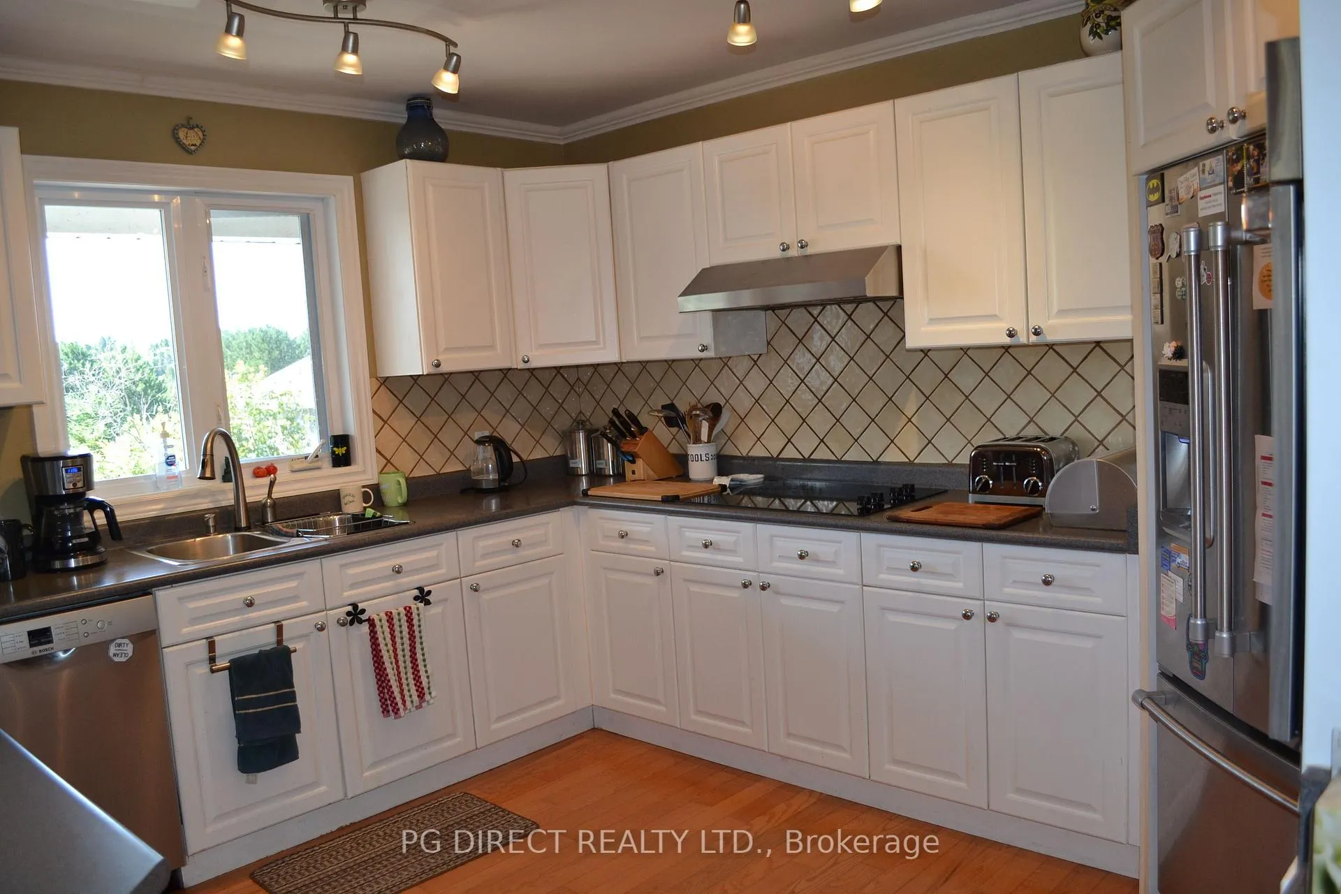 Photo 2 of 270 Pinecreek Crescent, Callander — HOMEH