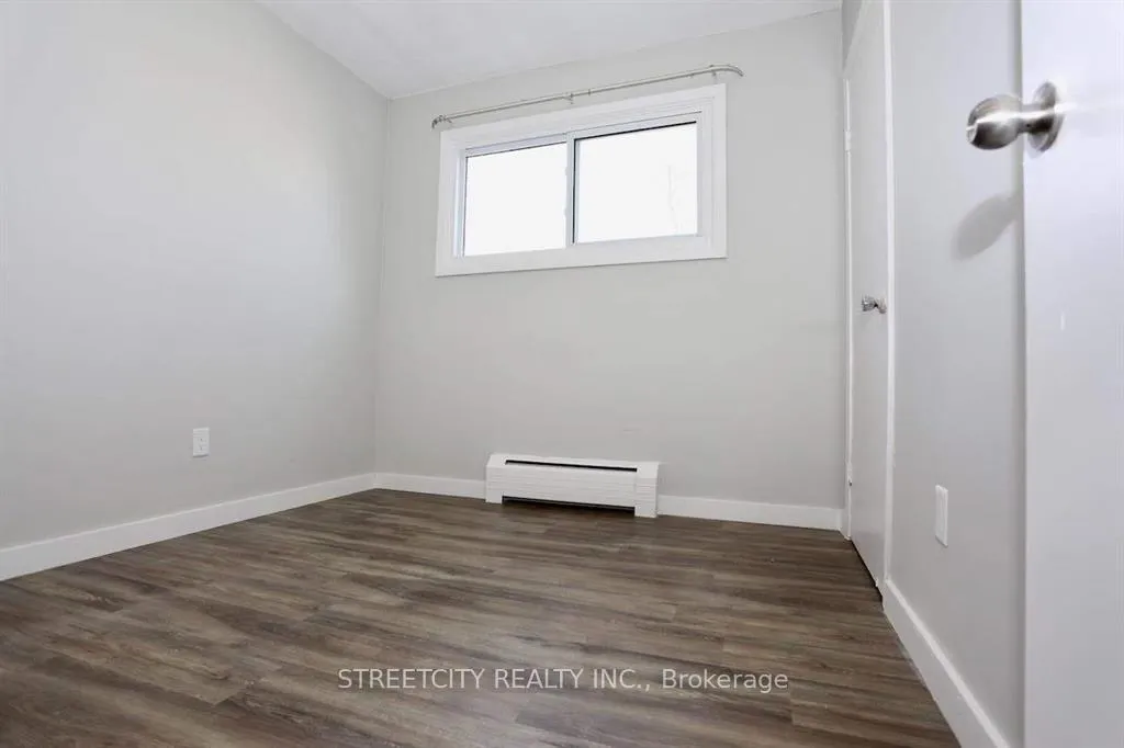 Photo 2 of 394 Thiel Street, London, East H — HOMEH