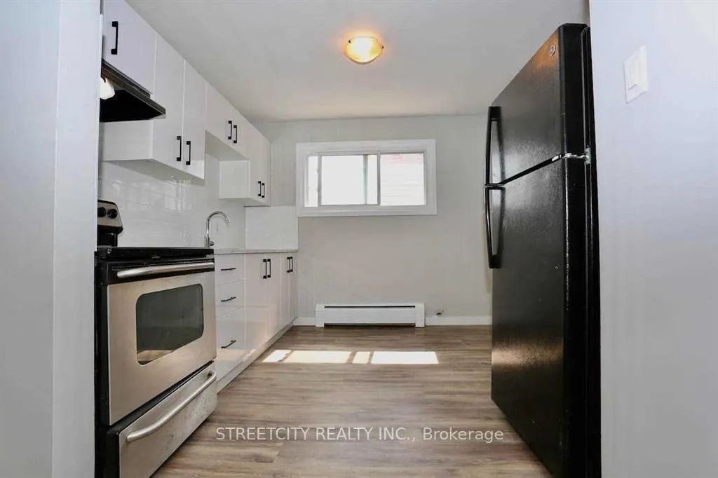 Photo 12 of 394 Thiel Street, London, East H — HOMEH