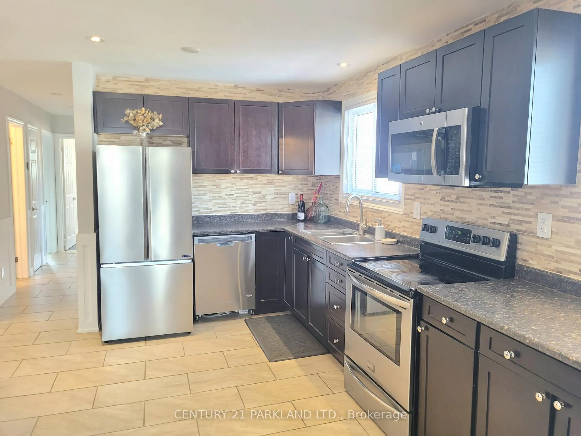 Photo 12 of 52 Franel Crescent, North York, Humber Summit — HOMEH