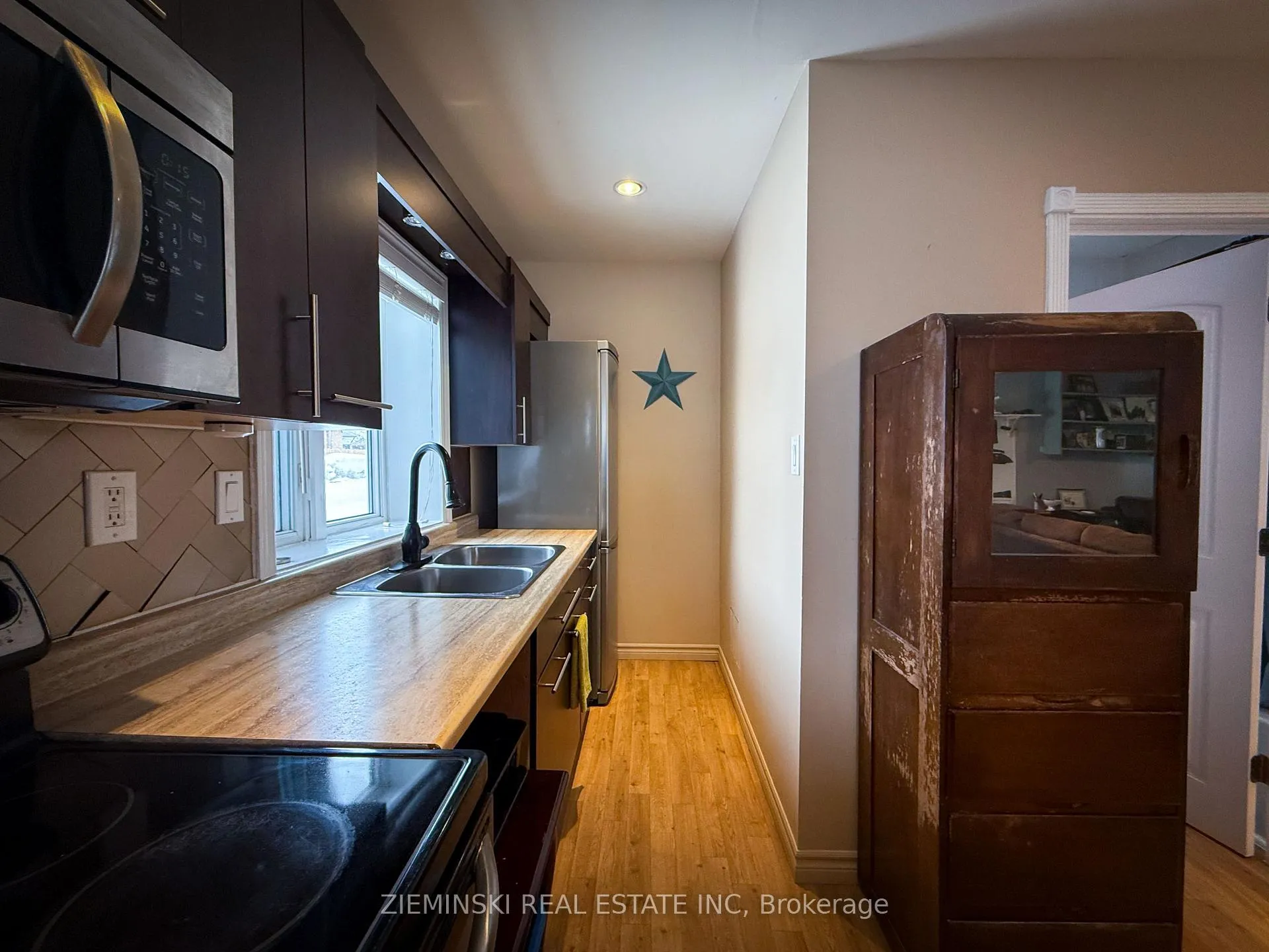 Photo 6 of 55 Eighth Avenue, Timmins, TNE - Central — HOMEH