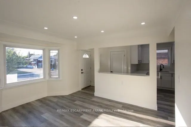 Photo 2 of Unit 1, 209 East 32nd Street, Hamilton, Raleigh — HOMEH