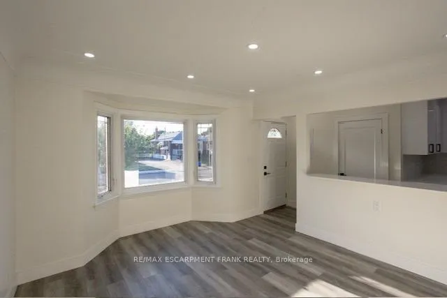 Photo 3 of Unit 1, 209 East 32nd Street, Hamilton, Raleigh — HOMEH