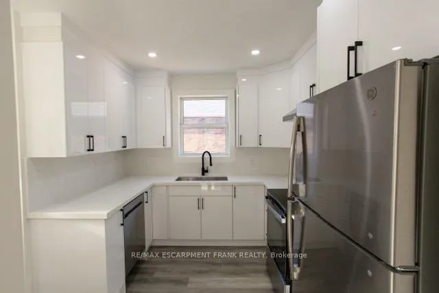 Photo 6 of Unit 1, 209 East 32nd Street, Hamilton, Raleigh — HOMEH