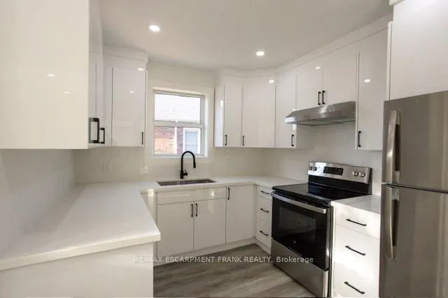 Photo 7 of Unit 1, 209 East 32nd Street, Hamilton, Raleigh — HOMEH