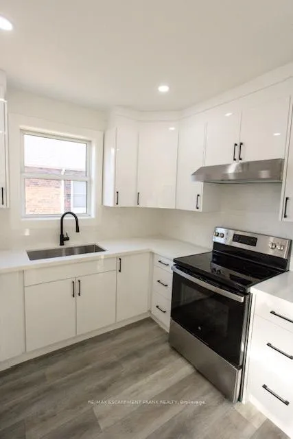 Photo 8 of Unit 1, 209 East 32nd Street, Hamilton, Raleigh — HOMEH