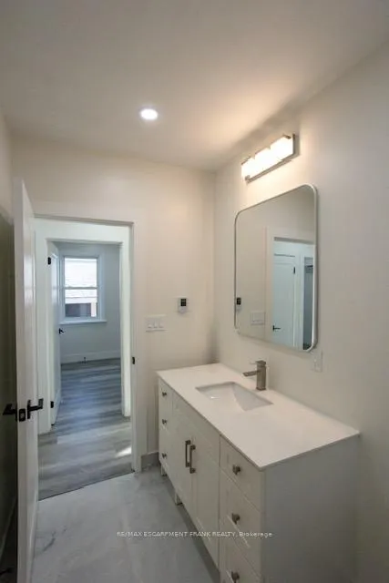 Photo 11 of Unit 1, 209 East 32nd Street, Hamilton, Raleigh — HOMEH