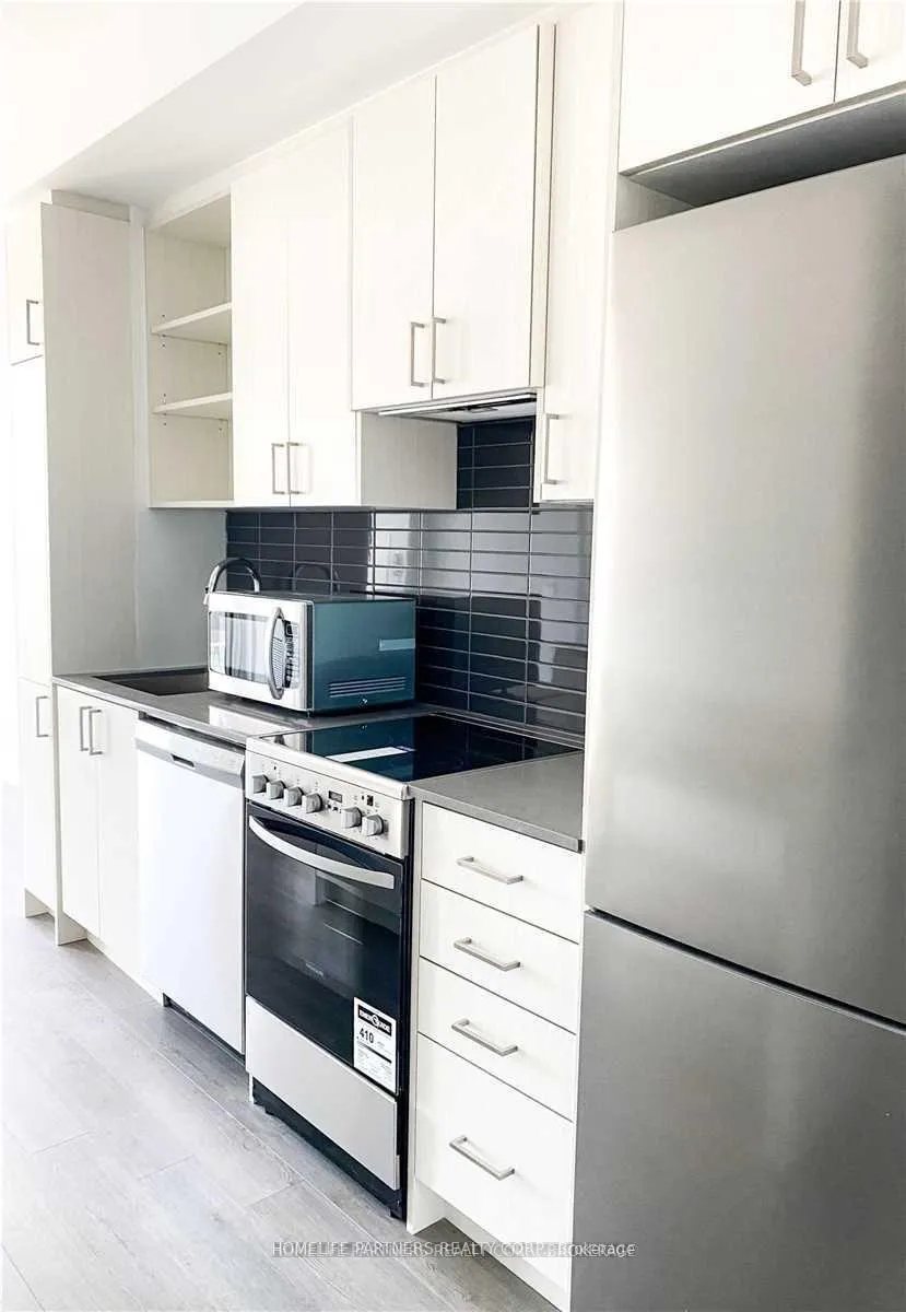 Photo 13 of Unit 13, 50 George Butchart Drive, North York, Downsview-Roding-CFB — HOMEH
