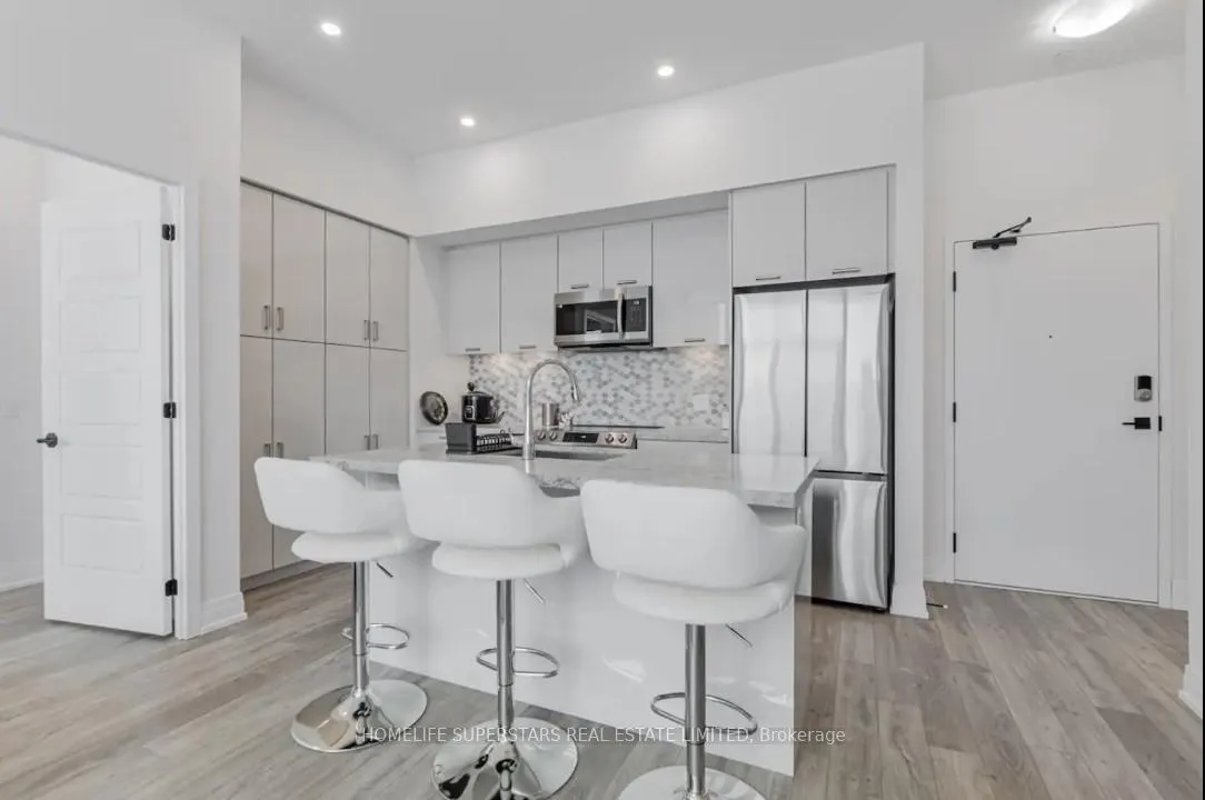 Photo 2 of Unit 407, 415 Sea Ray Avenue, Innisfil, Rural Innisfil — HOMEH