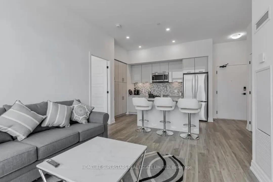 Photo 4 of Unit 407, 415 Sea Ray Avenue, Innisfil, Rural Innisfil — HOMEH