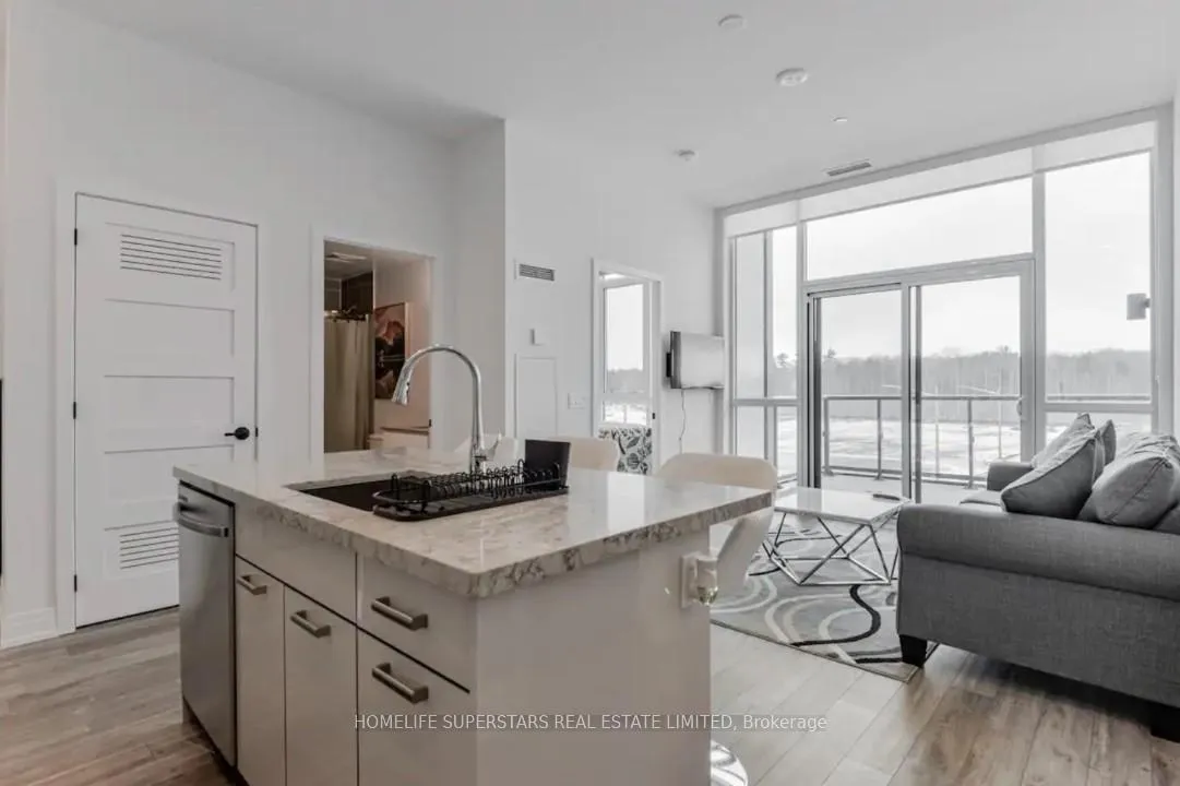 Photo 5 of Unit 407, 415 Sea Ray Avenue, Innisfil, Rural Innisfil — HOMEH