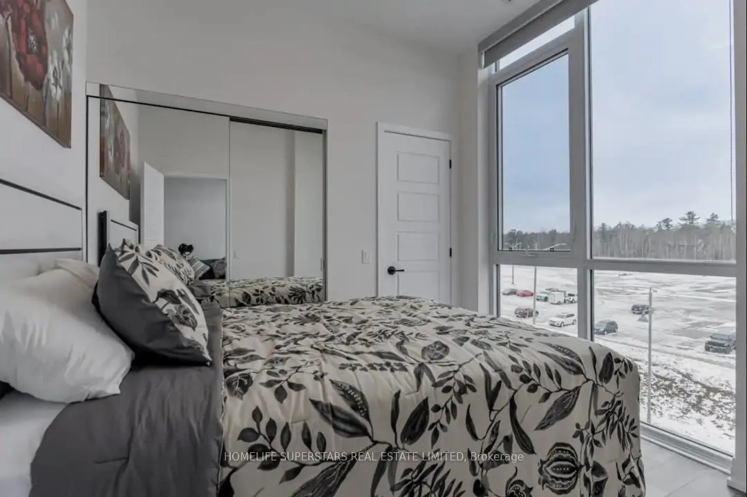 Photo 6 of Unit 407, 415 Sea Ray Avenue, Innisfil, Rural Innisfil — HOMEH
