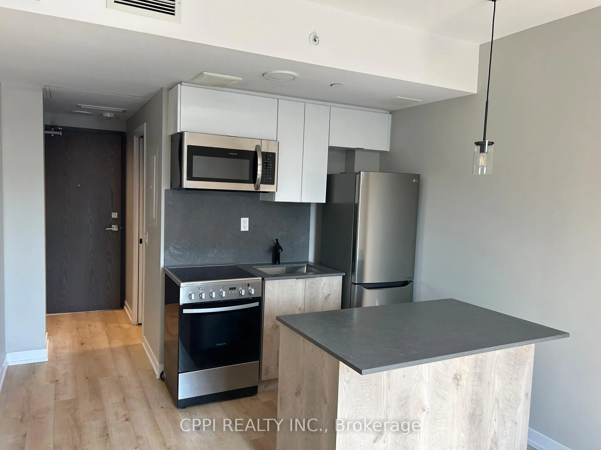 Photo 3 of Unit 219, 70 King Street E, Oshawa, Central — HOMEH