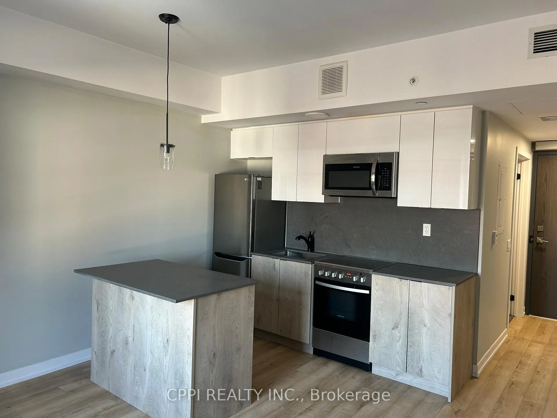 Photo 3 of Unit 402, 70 King Street E, Oshawa, Central — HOMEH