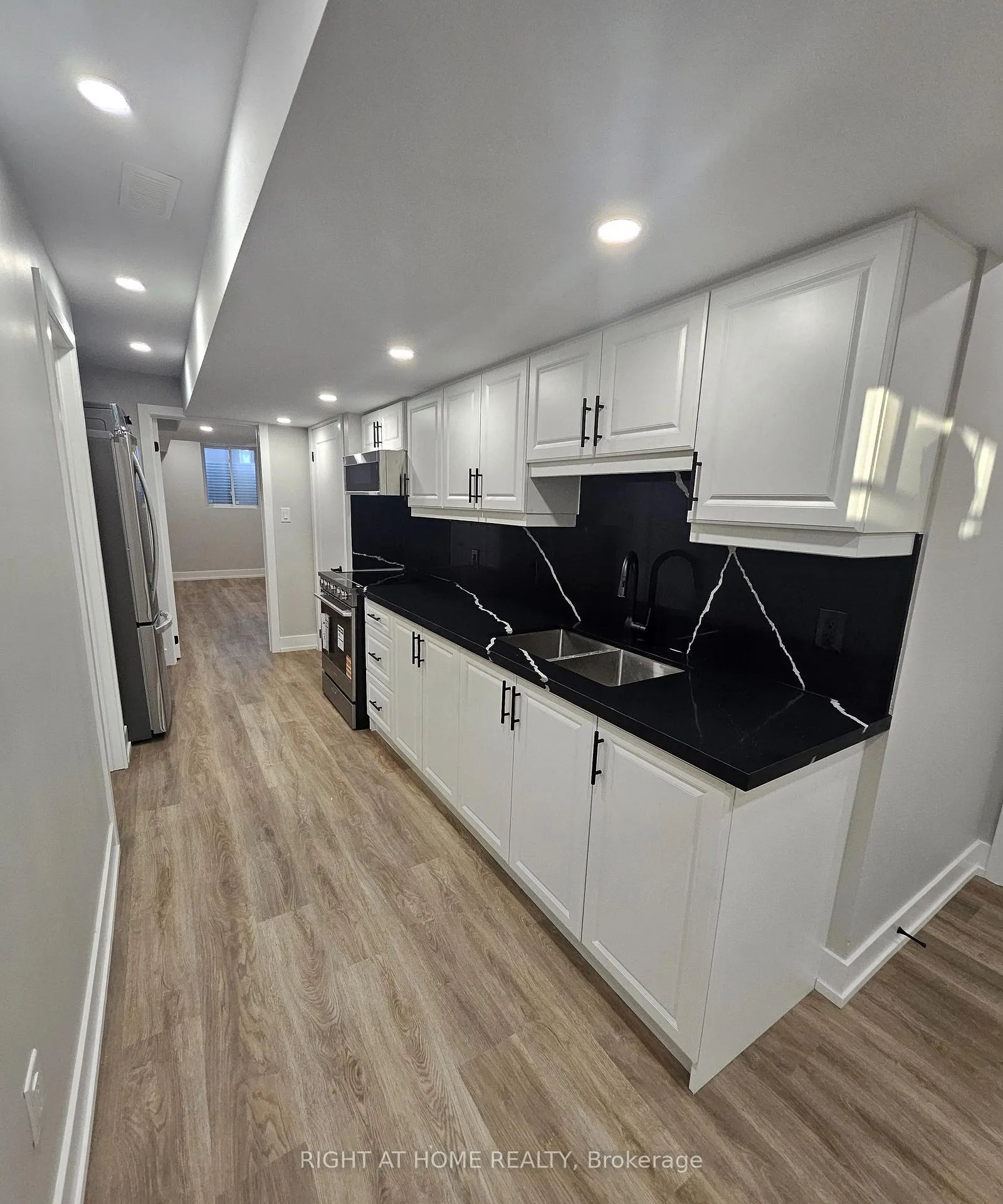 Photo 9 of Unit Lower, 852 Aspen Terrace, Milton, Cobban — HOMEH