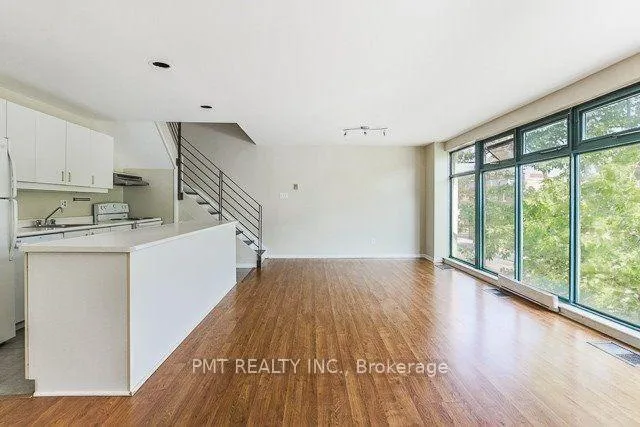 Photo 2 of Unit 1, 2064 Queen Street E, Toronto, The Beaches — HOMEH