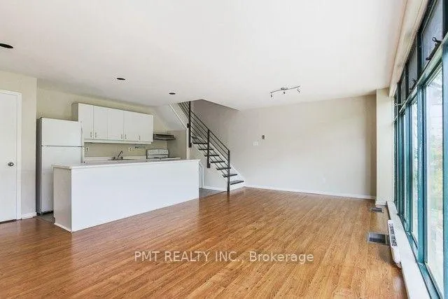 Photo 3 of Unit 1, 2064 Queen Street E, Toronto, The Beaches — HOMEH