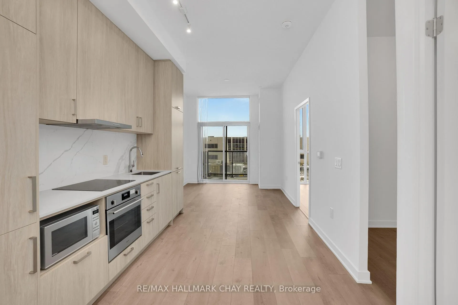 Photo 3 of Unit 217, 60 Honeycrisp Crescent, Vaughan, Vaughan Corporate Centre — HOMEH